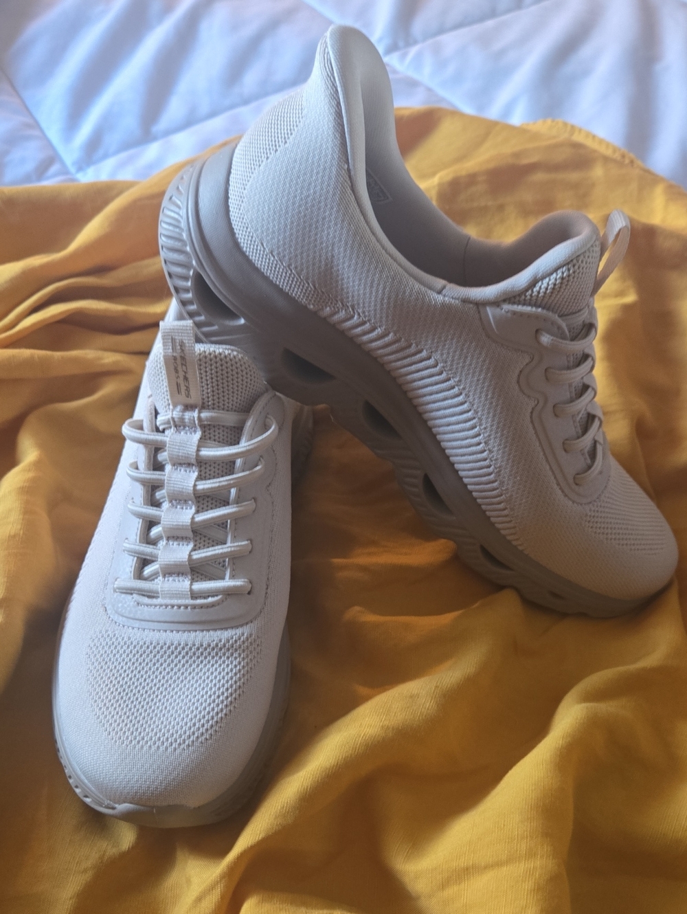 Skechers Women's All-White Knit Slip-On Sneakers